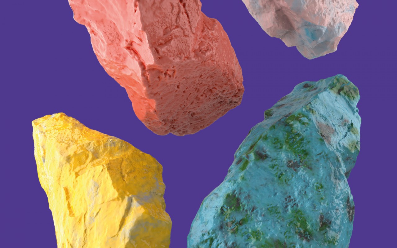 Four  multi-colored stones on the blue background